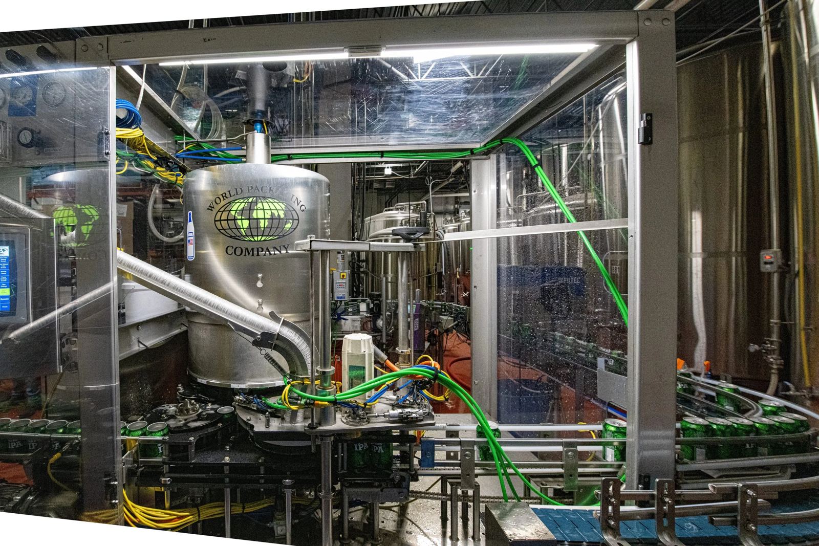 CP-12 filler with infeed and discharge conveyors