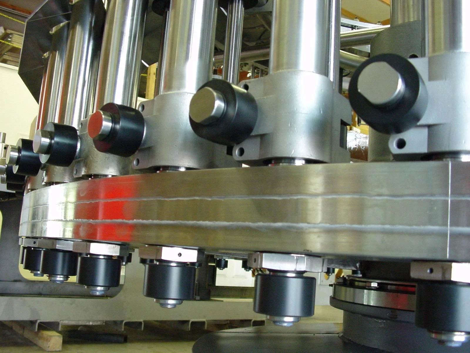 Stainless lift cylinders mounted on an internal air manifold hanger